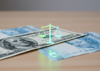 Dólar e real lado a lado