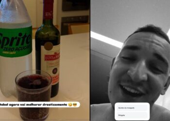 João Gomes ao lado direito. DO lado esquerdo uma garrafa de Sprite, de vinho e um copo com a bebida