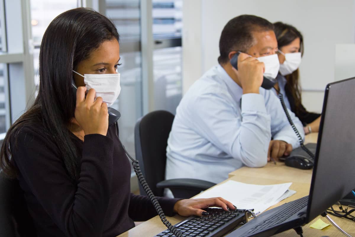 Brazilian workers using face mask coronavirus
