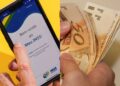 App Meu INSS ao lado de nota de R$ 50,00