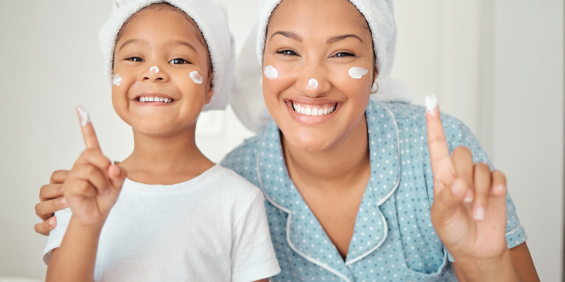 Skincare, grooming and portrait of mother and daughter smile, happy with hygiene treatment and face cream while bonding in bathroom. Cleaning, beauty and facial with excited girl and parent selfcare.